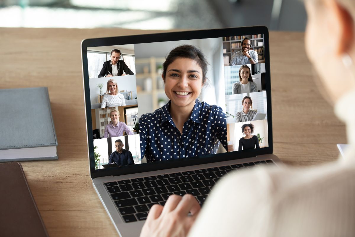 Zoom teleconferencing screen displaying students faces.